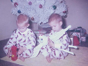 Christmas is magical at this age...I always hated that fake white tree though.